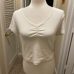 Fred Meyer cute white crop top with lace up back. Size L but fits like M.
